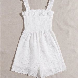 White eyelet romper , perfect for summer .
